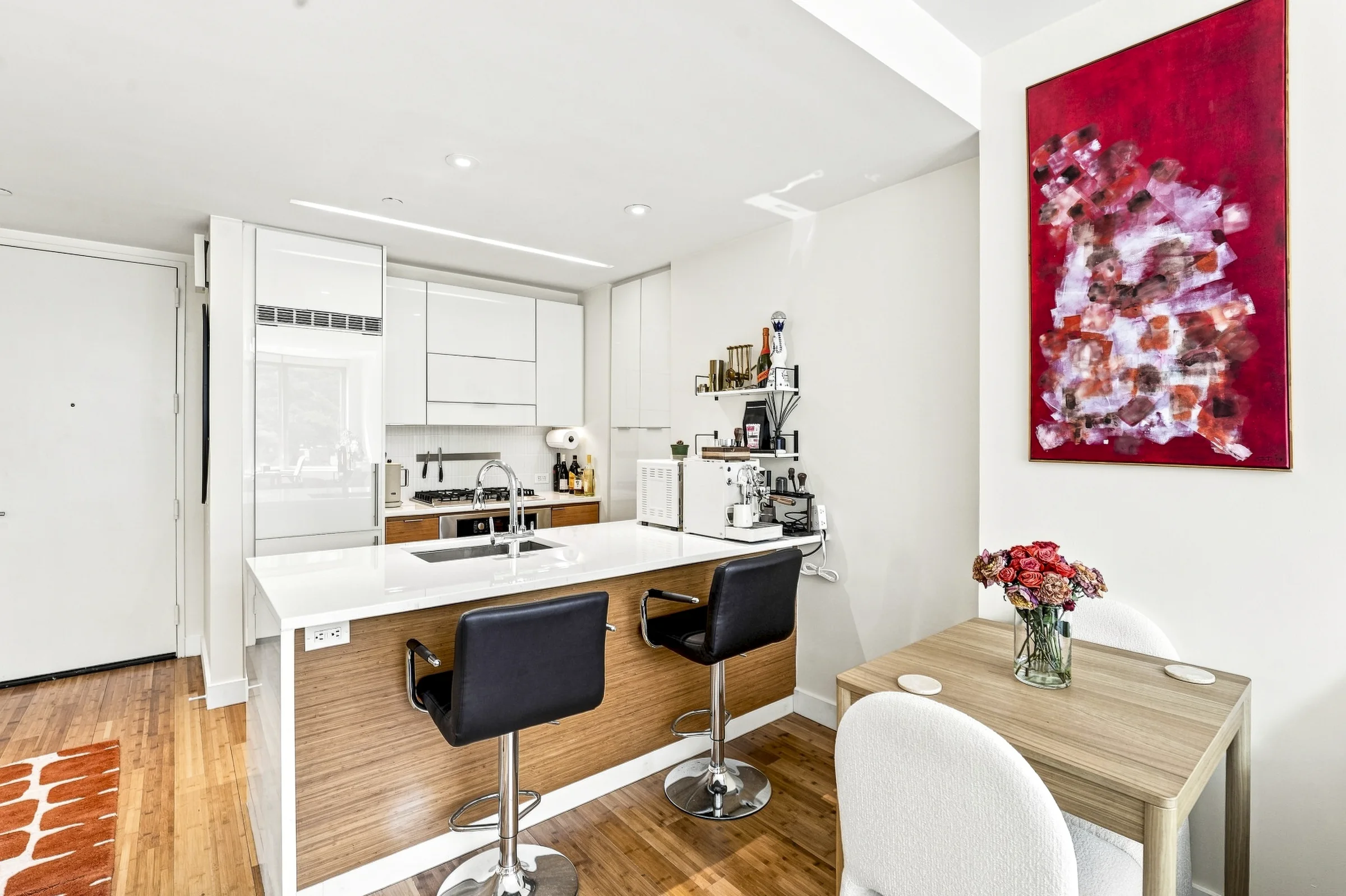 Bright apartment kitchen photographed for a real estate listing